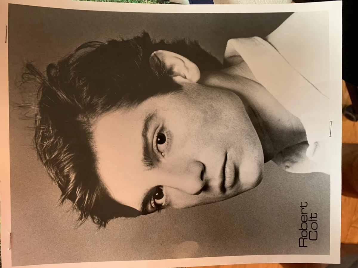 Robert Colt at 22, black and white headshot
